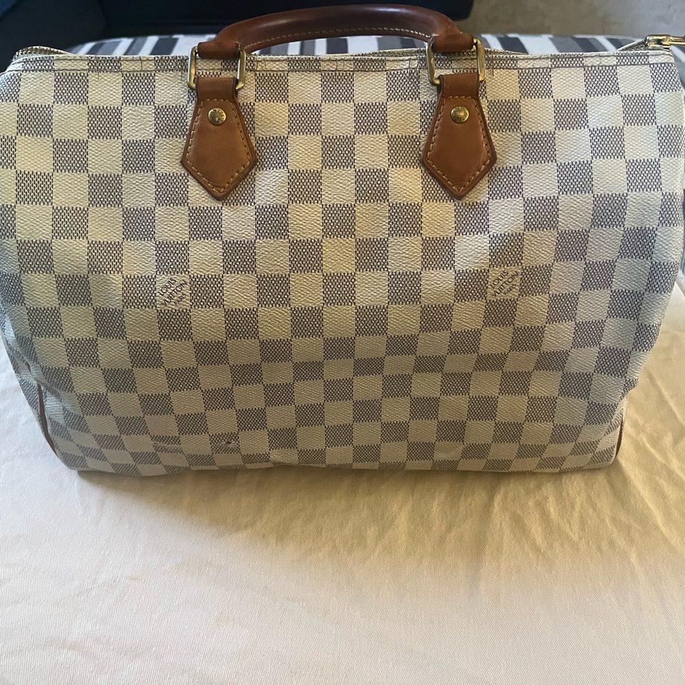 Damier Azur 35 in good condition, comes with lock but no key dust bag included.